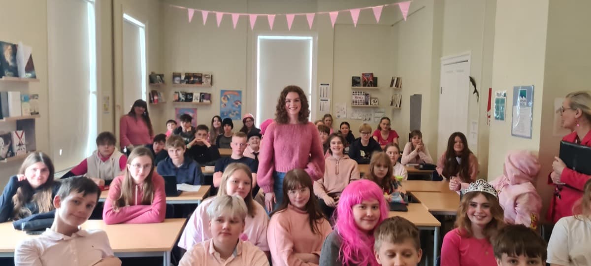 A classroom full of students at an event